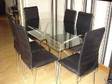 150CM X 90cm Glass Top Table with 6 dining chairs all in....