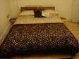 near new double bed. NEW pine double bed with double....