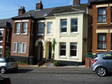 This bay fronted hall entrance terrace house is delightfully situated and has a